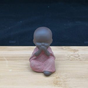 Small Buddha statue monk figurine